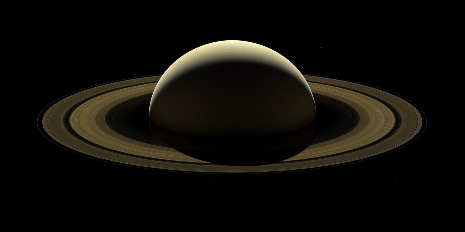 Saturn and its rings backlit by the Sun, seen by Cassini