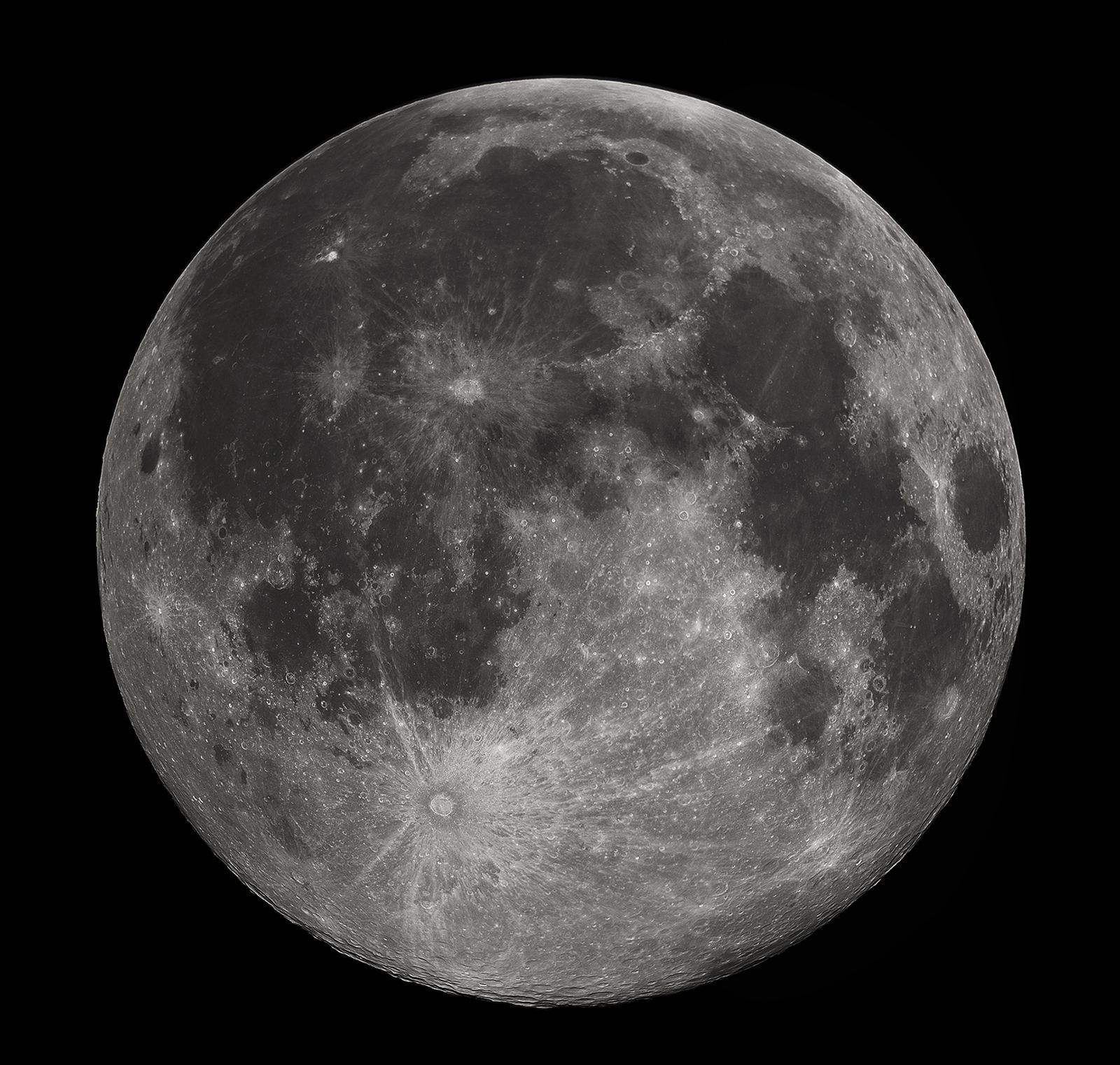 A sharp, detailed photograph of the full Moon showing dark maria and bright cratered highlands